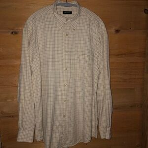 Nautica 
button front shirt
100% Cotton 
Size Large
Cream w/ black & tan plaid